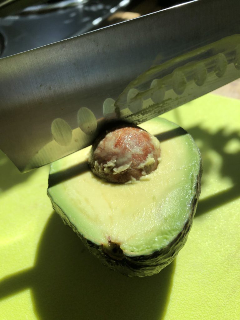 Knife in Avocado Pit - Tuttle Kithcen